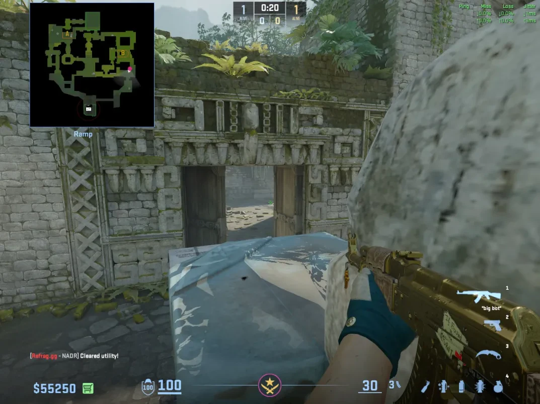 A CT holds the top of the box at Ancient Ramp after being boosted into position.