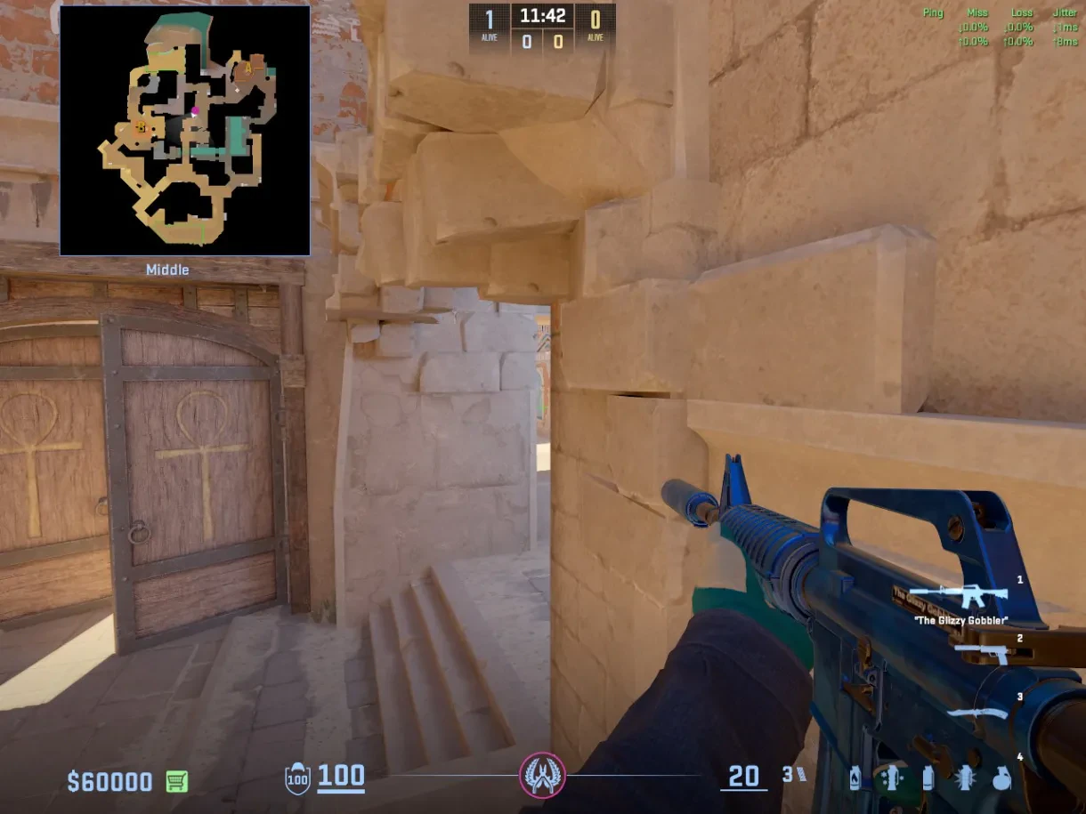 A CT holds the tucked Middle angle beside the stone doorway.