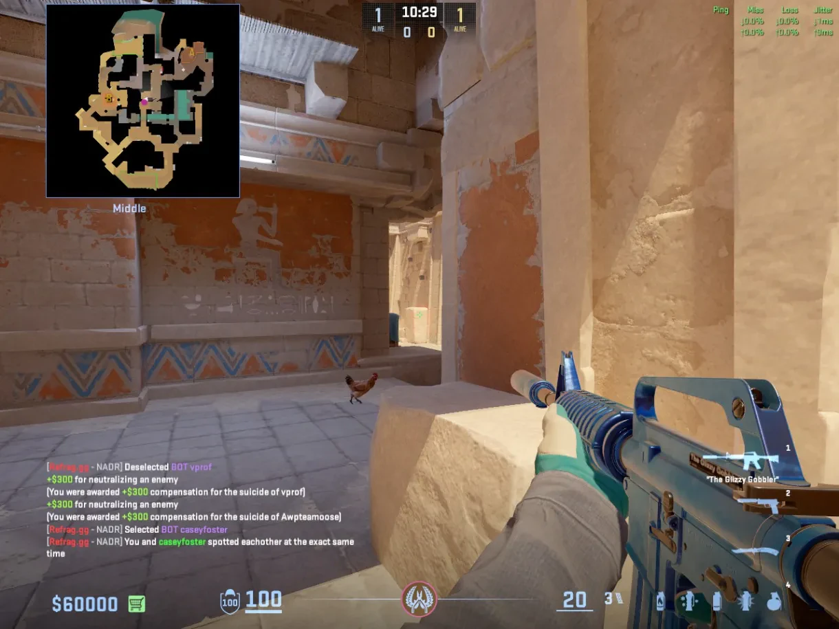 A CT holds Middle from behind the small rock near the doorway.