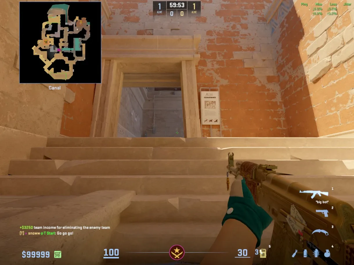 A T aims up the Canal stairs while holding the E-Box headshot angle.
