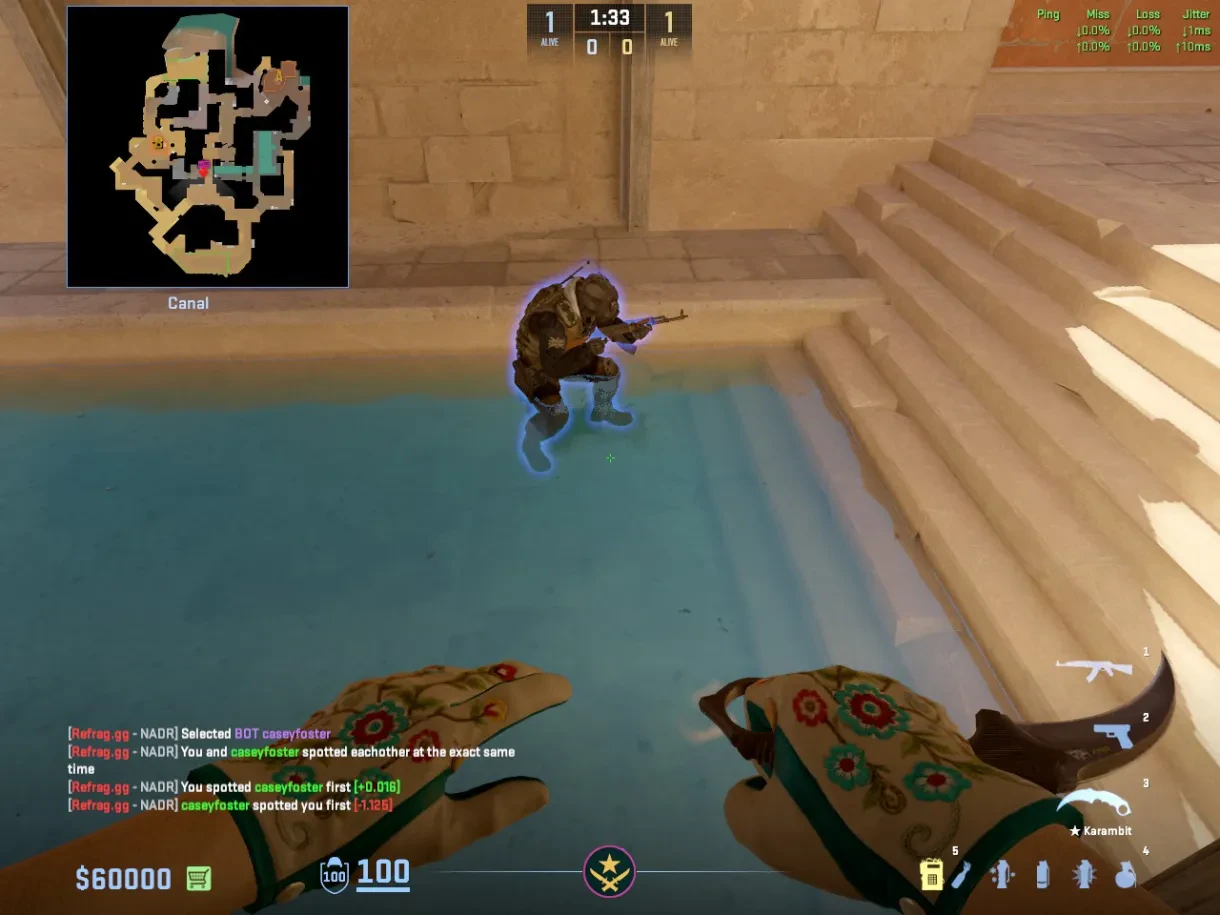 A T catches a CT crouched in the Canal water beneath the angle.