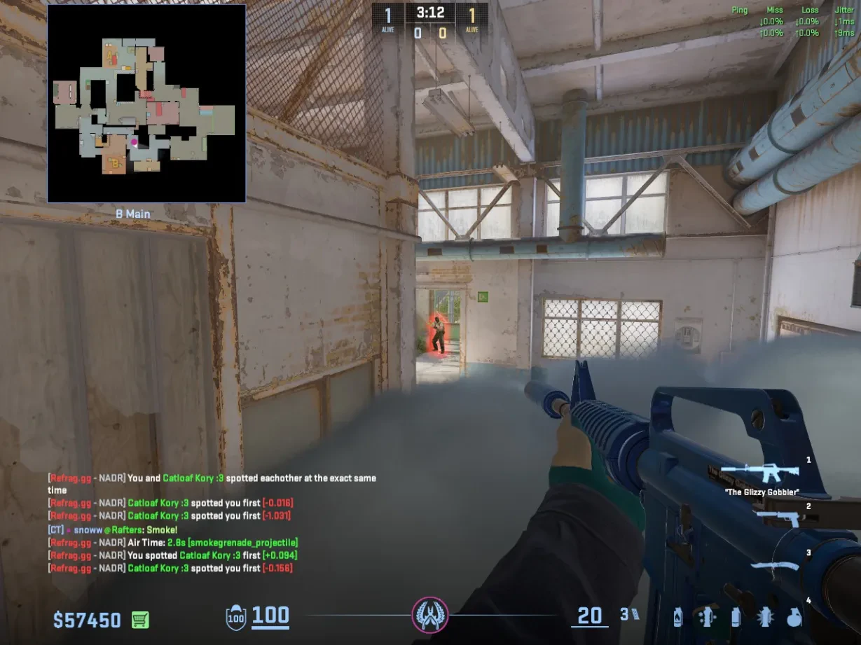 The boosted CT player holds the B Main doorway through the smoke.