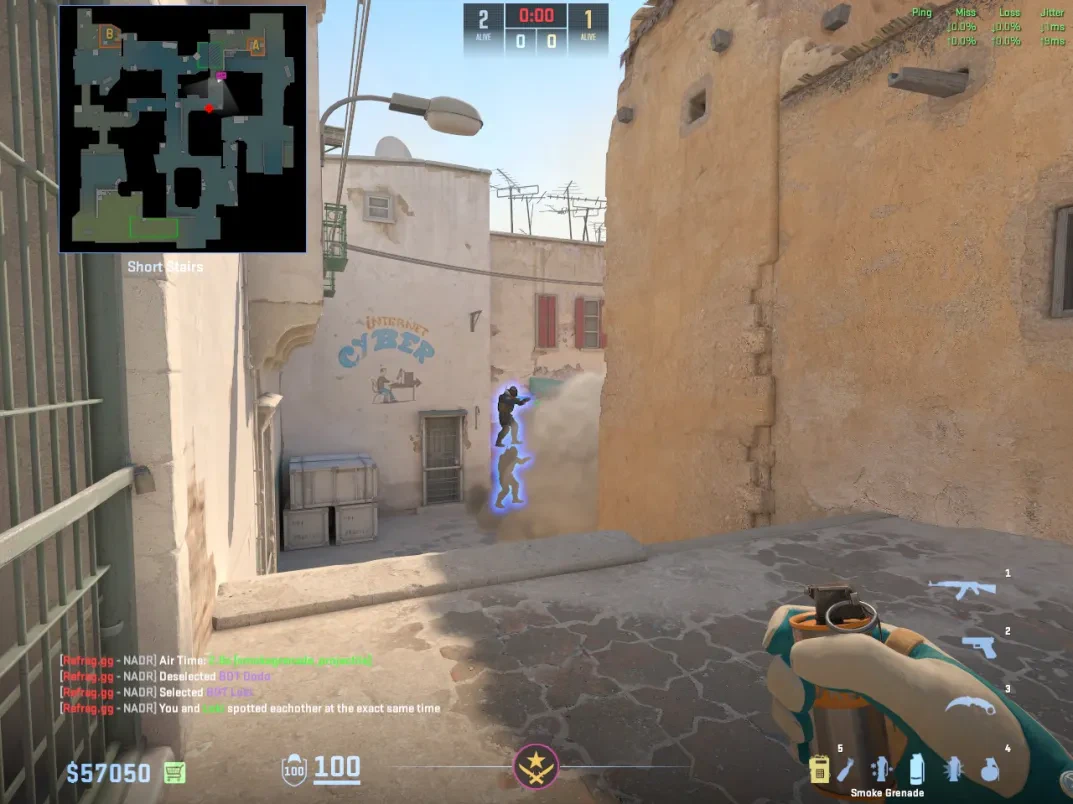 Two CT players stack at Short Stairs as the rifle boost takes position.