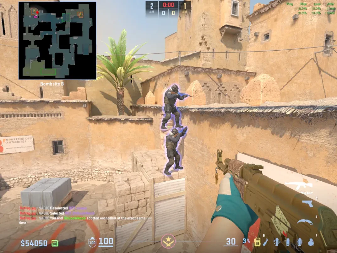Two CT players stack at B so one player can climb toward the window ledge.