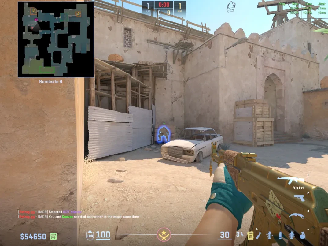 A T player watches a CT tucked beside the wood panels at B Closet.